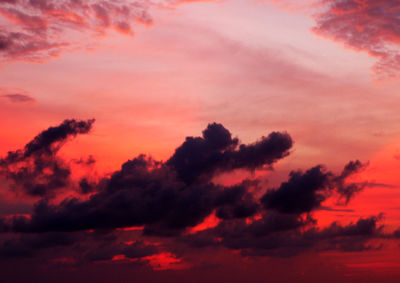 Low angle view of dramatic sky during sunset