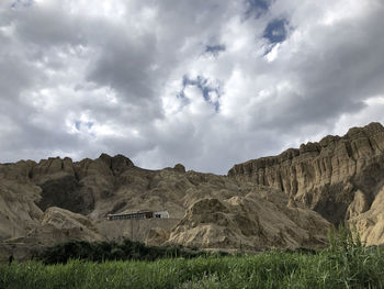 Scenic view of rocky mountains against sky