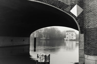 Arch bridge over river