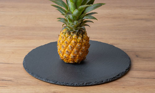 Close-up of pineapple on table