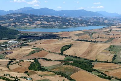 Aerial view of landscape and mountains against sky