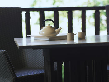 Close-up of lamp on table at home