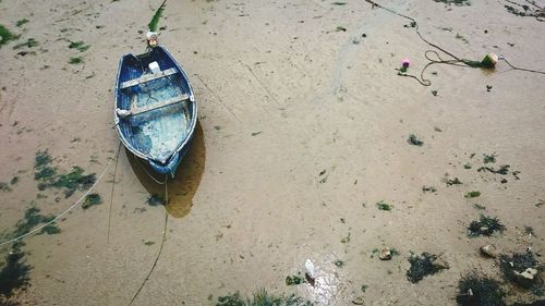 High angle view of boat moored at beach