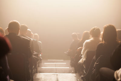 Rear view of people enjoying music concert