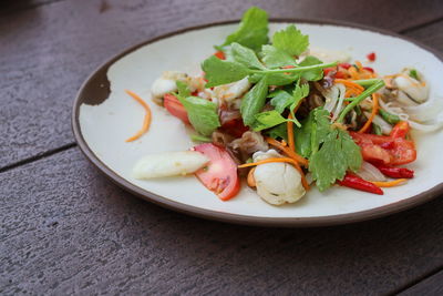 High angle view of salad in plate on table