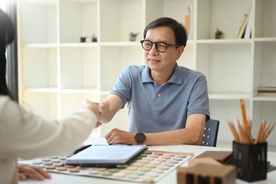 Business colleagues working at office