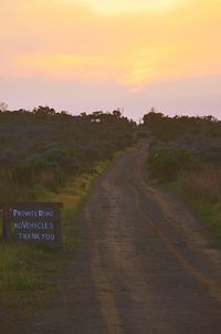 Road passing through field