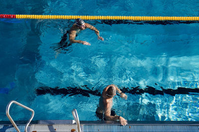 People swimming in pool