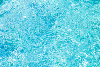 Full frame shot of blue water in swimming pool