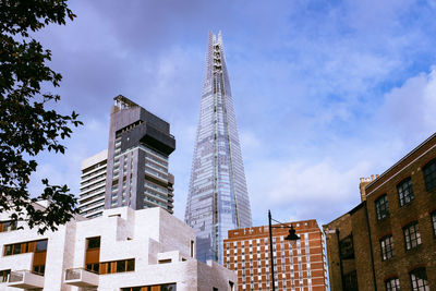 Low angle view of skyscrapers against sky