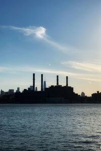 City by sea against sky