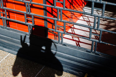 Shadow of man working at construction site