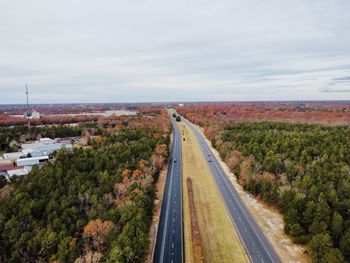 High angle view of highway in city against sky