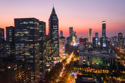 Illuminated buildings in city
