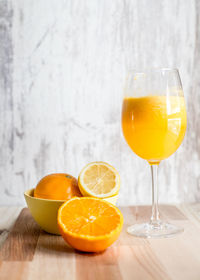 Orange juice in glass on table