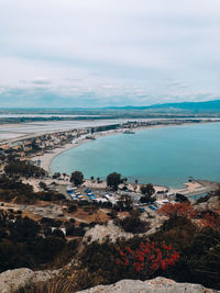 High angle view of bay against sky