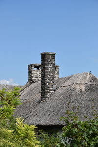 Low angle view of historic building against clear sky