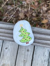 High angle view of heart shape on wooden plank