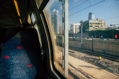 Railroad tracks seen through train window