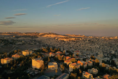 High angle view of townscape against sky at sunset