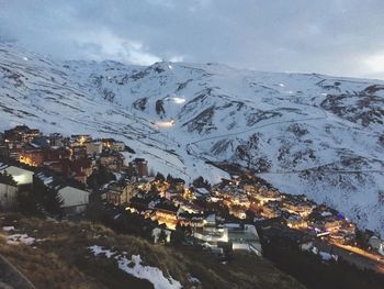 Aerial view of illuminated city during winter