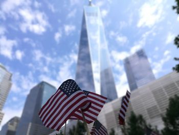 Low angle view of flag against sky