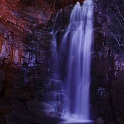 View of waterfall in cave