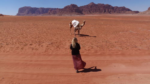 Full length of senior man in desert
