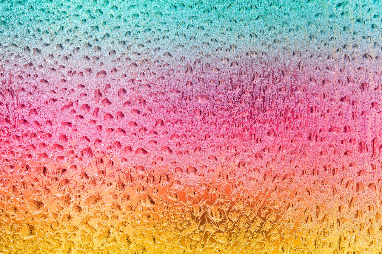 FULL FRAME SHOT OF MULTI COLORED WATER SURFACE