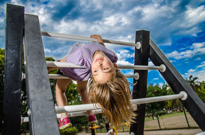 Portrait of happy blond girl in playground