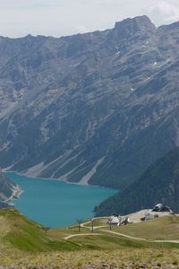 High angle view of lake against mountain range