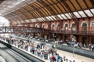 People waiting at railroad station