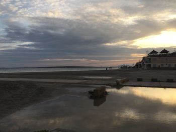 Scenic view of sea against sky at sunset
