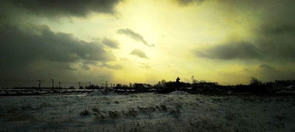 Scenic view of cloudy sky at sunset