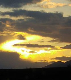 Scenic view of dramatic sky during sunset