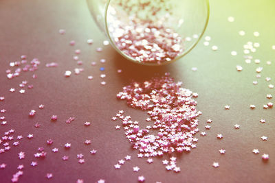 Star shape decoration spilling on table