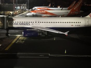 High angle view of airplane on airport runway