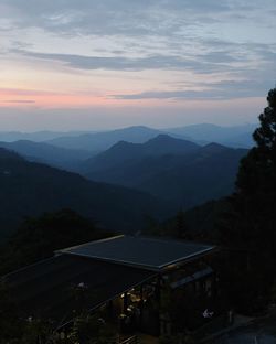 High angle view of buildings against sky at sunset