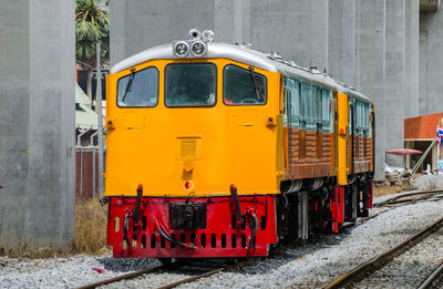 Train on railroad track in city