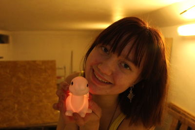 Portrait of a smiling girl holding ice cream