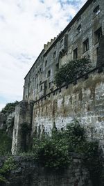 Low angle view of historic building against sky