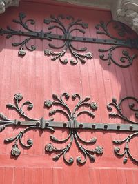 Close-up of text on red door