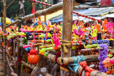Multi colored decoration for sale at market stall