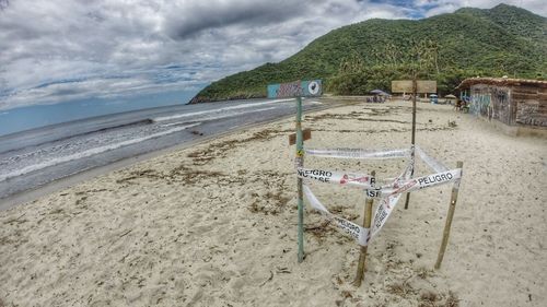 Scenic view of beach against sky