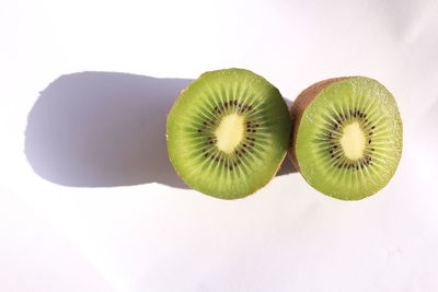 Close-up of bananas over white background