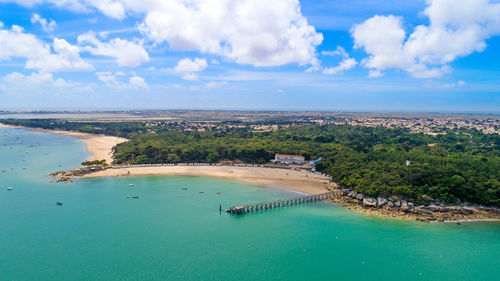 High angle view of sea against cloudy sky