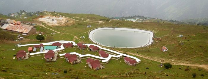 Scenic view of landscape with town in background