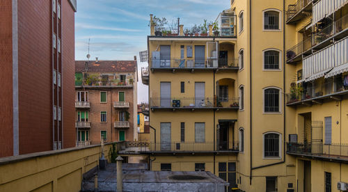 View of typical apartament building in the streets of turin, italy.