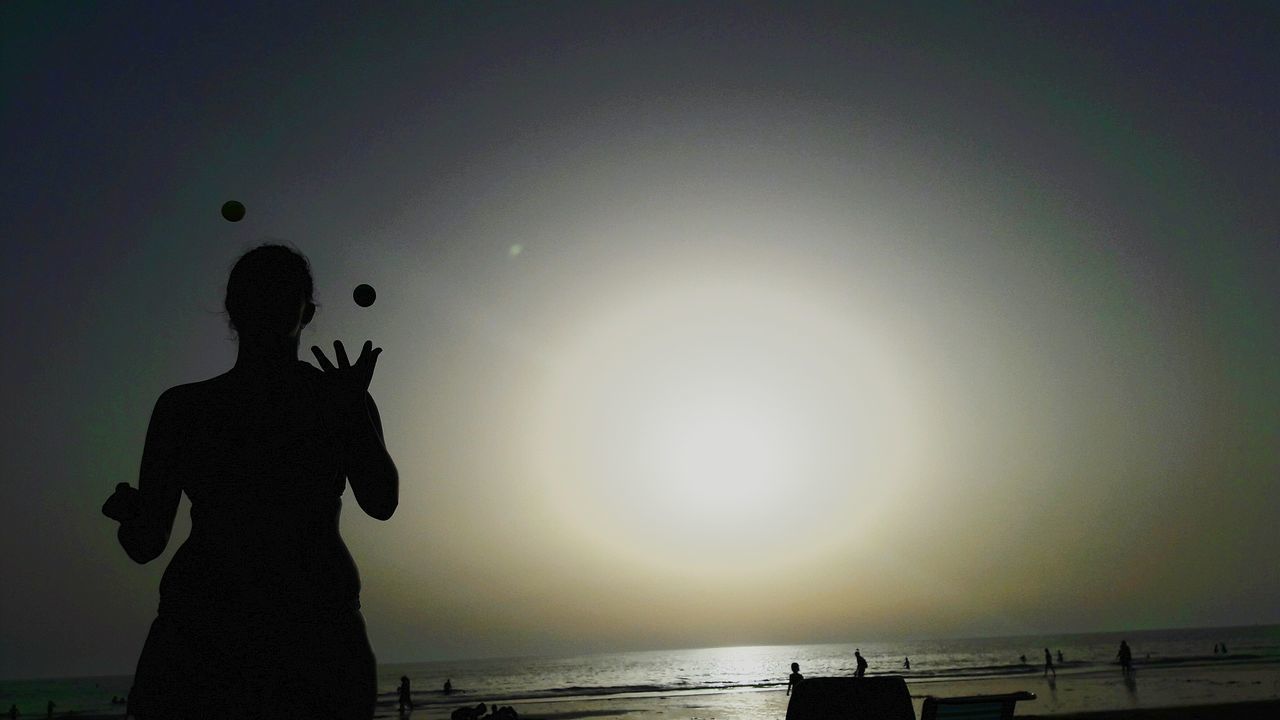 SILHOUETTE STATUE IN WATER