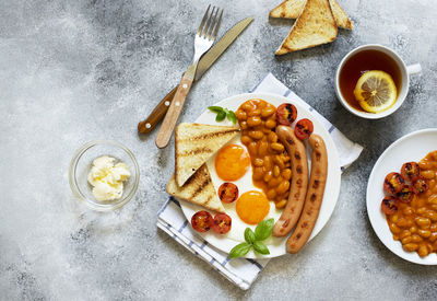 High angle view of breakfast served on table